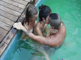 Gorgeous ladies seduce a fellow for a fuck during a swim