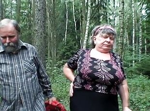 Perverted granny is sucking in the forest