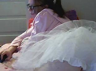 Cute girl in frilly skirt doing webcam chat