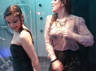 Sexy skirts and blouses on chicks dancing in the rain