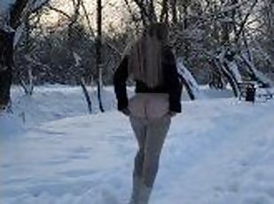 Hot blonde shows her ass outside