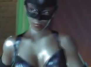 Sexy 3D Catwoman demonstrates her perfect body indoors