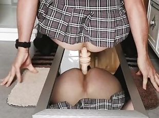 Sissy riding her favorite dildo wearing a lovely short schoolgirl skirt