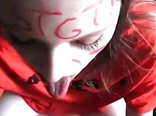 Horny teen with face paint sucking on a wang