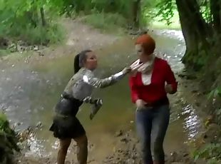 Softcore Catfight In The Mud With Two Wet and Messy Babes
