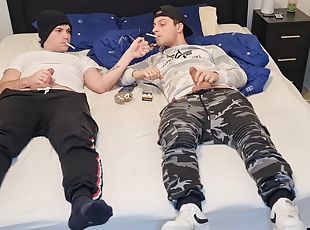 Gay couple smoking, kissing, wanking their big dicks, blowing and cumming on the ashtray