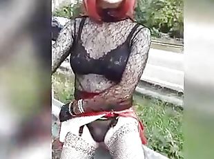 sissy in sexy outfit shows her clit by the ring road