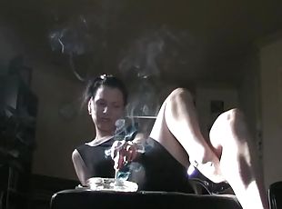 Noir style smoking with sexy girl in a dress