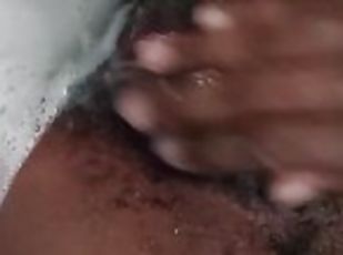 Close up Ebony play with her pussy in the bath until squirt