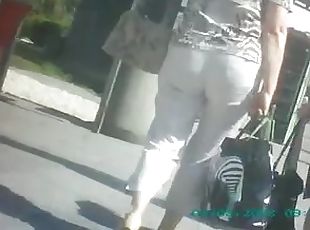 A gal wearing a miniskirt gets caught on a voyeur's cam