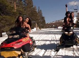 Horny chicks having fun at the ski resort and showing their tits