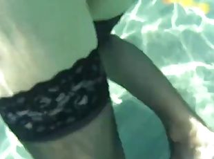 Black stockings and anal beads in the sea