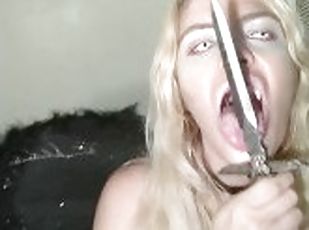 succubus teases herself with a ceremonial dagger and fucks blade side