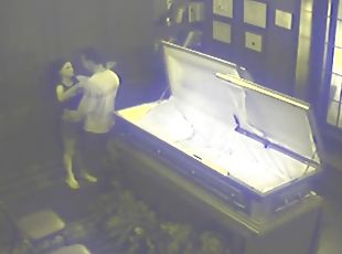 Voyeur sex in a coffin with a kinky couple