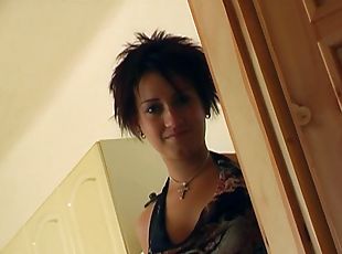 A cute girl with short hair jerks a guy off and makes him cum