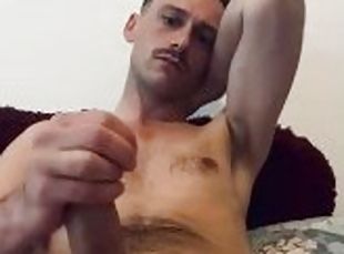 Guy plays with his hard dick in the morning until cum