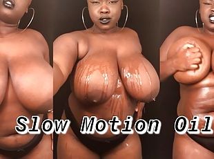 Slow Motion of BBW Rubbing Oil on Natural Black Tits & Curvy Body