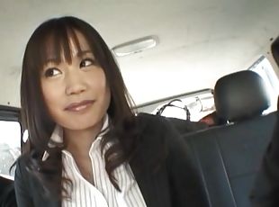Pretty Japanese chick Kasumi Uemura gives a BJ in back of the car