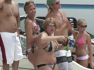Babes on the yacht showing off pussy and ass in bikini