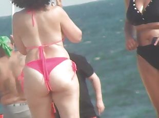 Sexy MILFs with big butts on the beach