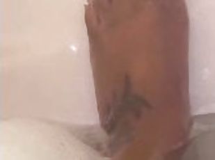 Hennesyheat sexy ebony  feet fresh manicure taking a bubble bath.