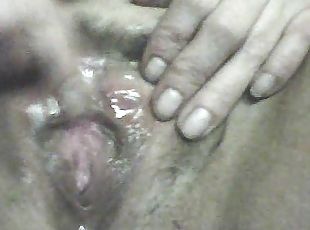 Up close view of her leaky pussy being rubbed