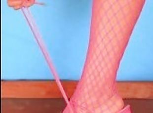 Pink strappy heels fishnets stockings