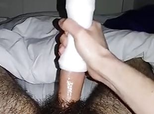 A masked man tries a Fleshlight for the first time
