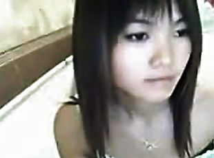 Adorable Asian teen on webcam