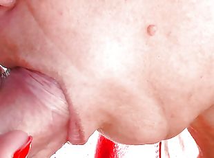 MILF in sexy red leather dress gives close-up blowjob and swallows cum to play with in her hands