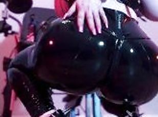 Pink haired Luvie Doll polishing big shiny latex leggings ass in domina high heels with long nails
