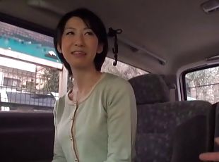 Kinky Japanese model getting attacked with a vibrator on the back seat