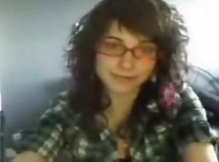 Teen babe wearing glasses loves teasing horny fellas via webcam