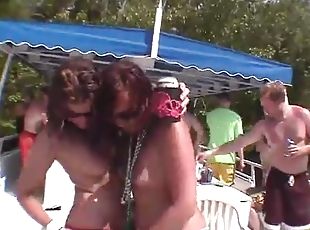 Camera follows sexy party girls on the boat
