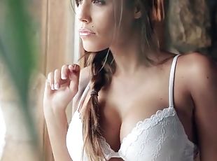 Satin Bloom sensually models white lingerie