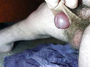 Midget plays with tight foreskin and cum quickly