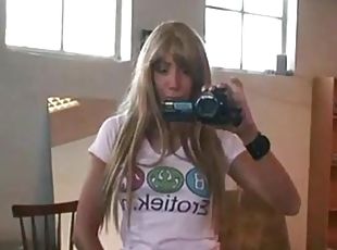 Girl with video camera play her pussy