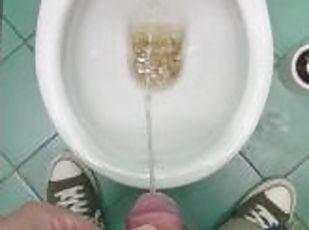 Pissing in public bathroom