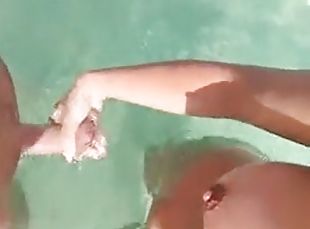 Playing with stepdads dick in the water while mom is sunbathing