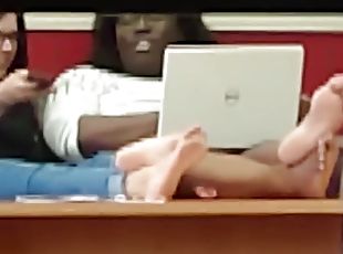 Candid two pairs of big soles in a public college